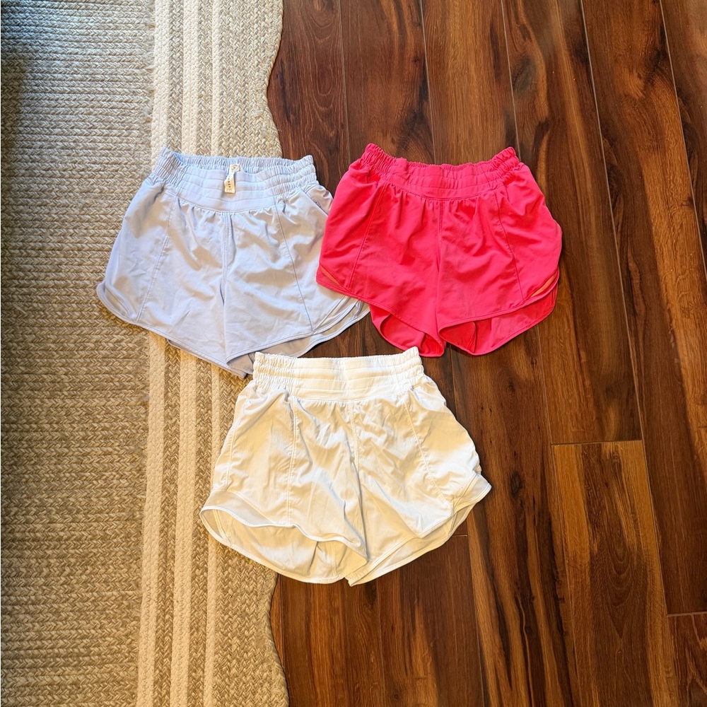 Lot Lululemon 4 inch hottie hot shorts size 2 blue, pink, White